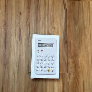 Supreme x Braun White Calculator